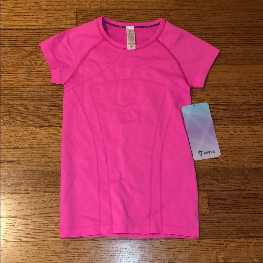 SUPER CUTE NEVER WORN PINK GIRLS IVIVVA TOP